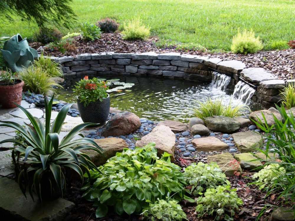 green-grass-yard-decorated-with-small-backyard-pond-ideas-and-cute-waterfall-also-tiny-stone-arrangement-plus-fish-statue